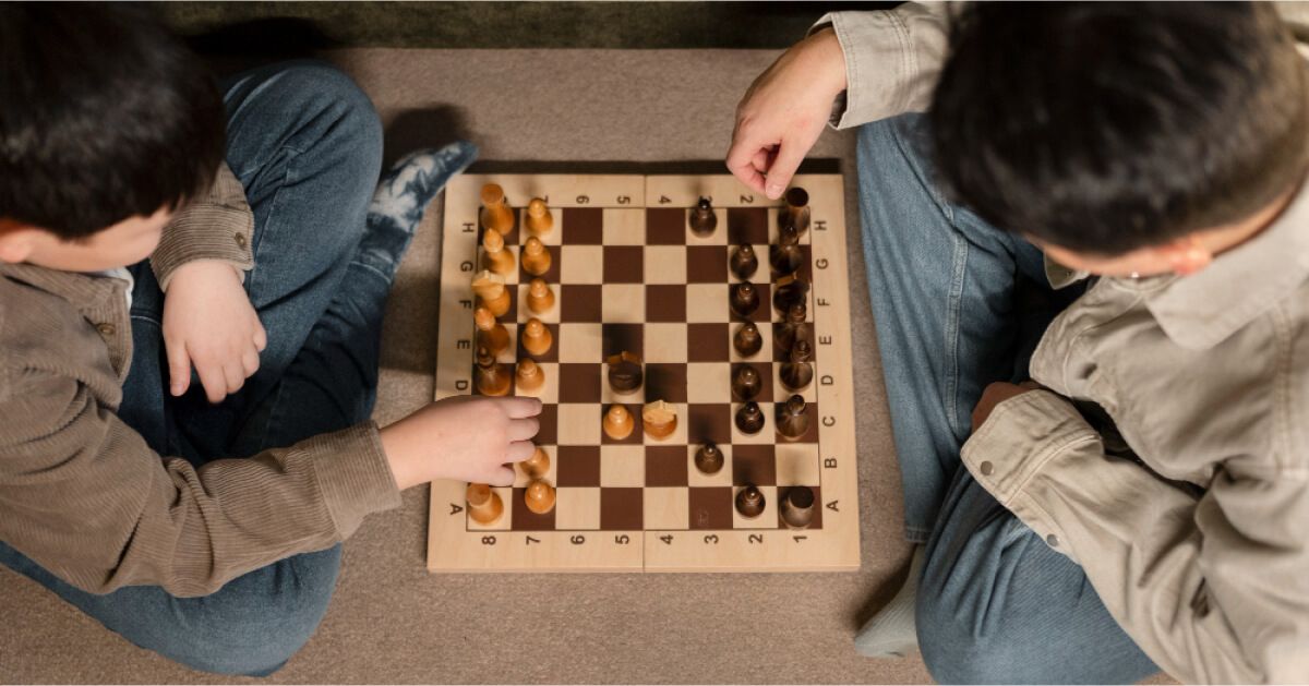 Two people playing chess