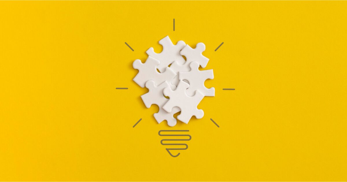 Puzzle pieces in the shape of an idea bulb 