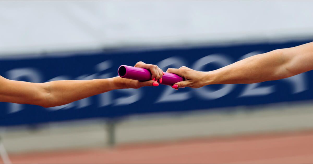 Two women playing relay