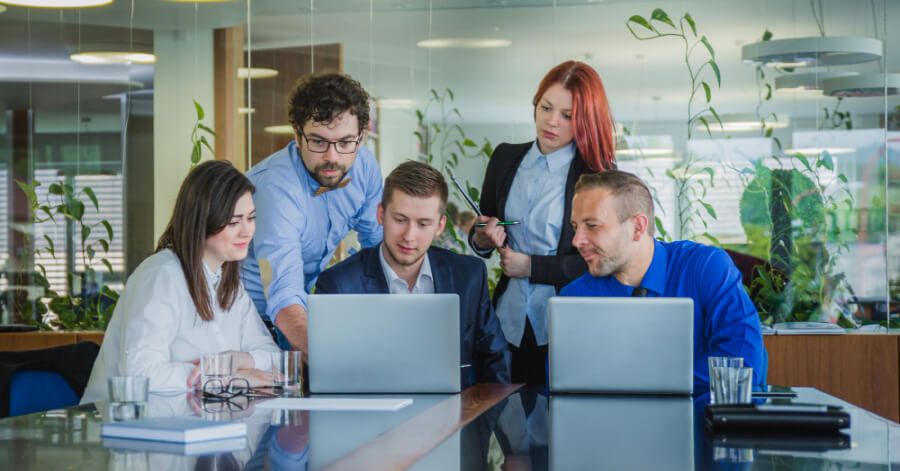 Employees discussing together