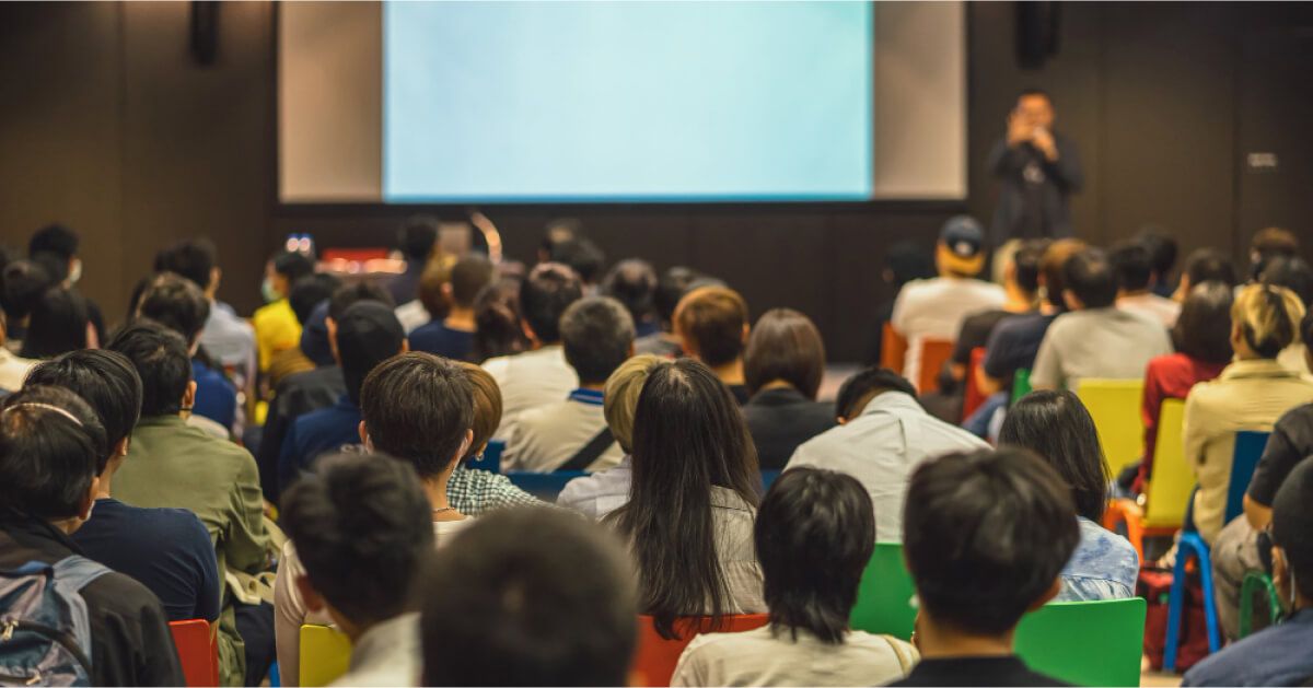 People sitting in an auditorium