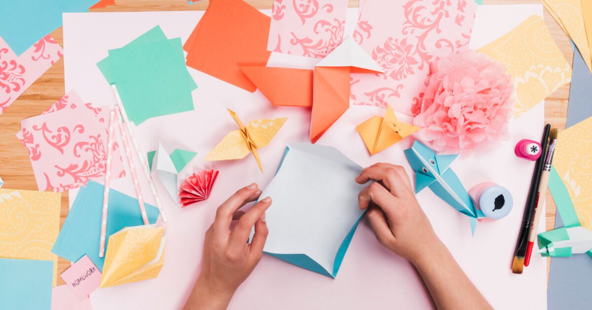 A person doing origami