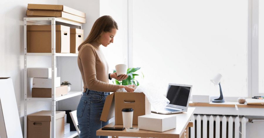 Employee packing her office things