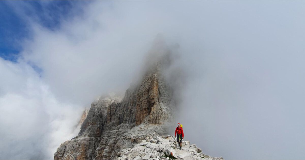 A man hiking on a hill