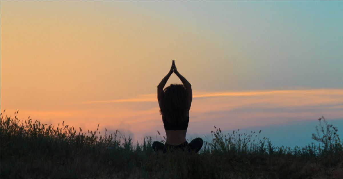 A woman practicing yoga