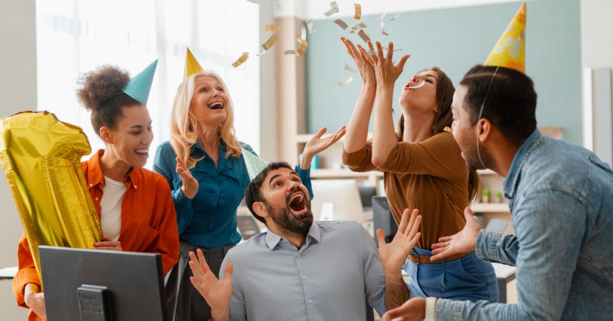 Employees celebrating a birthday