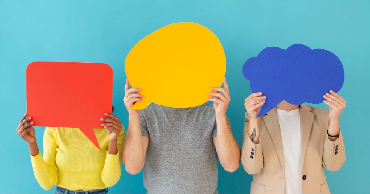 Three people holding speech bubbles