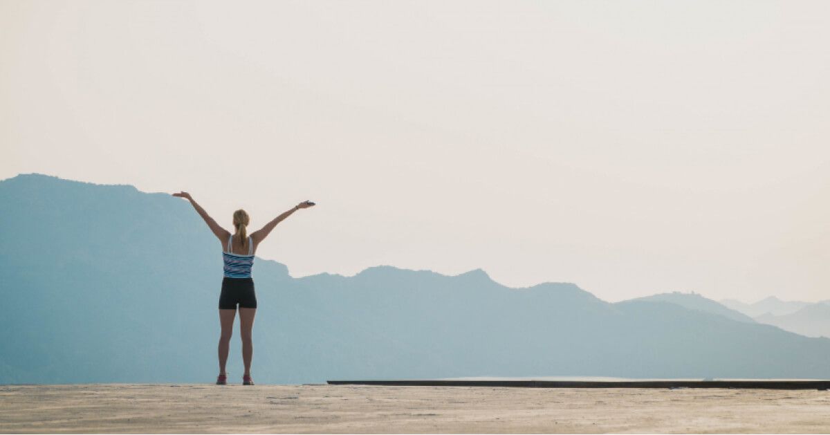 A woman overlooking the hills