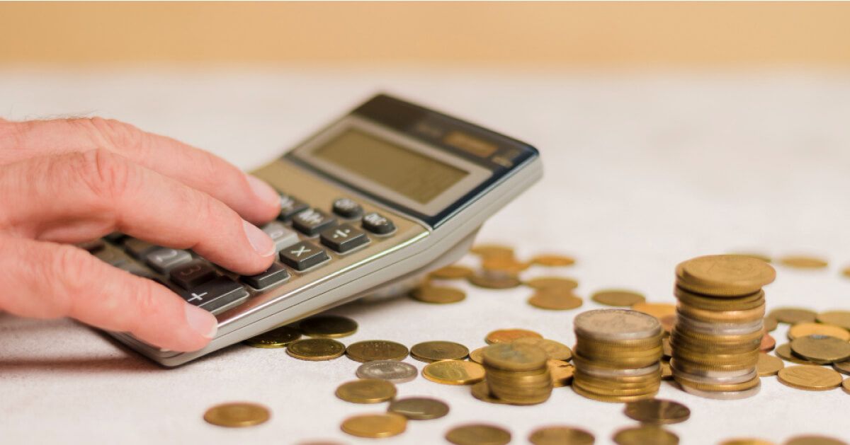 A person calculating with a calculator 