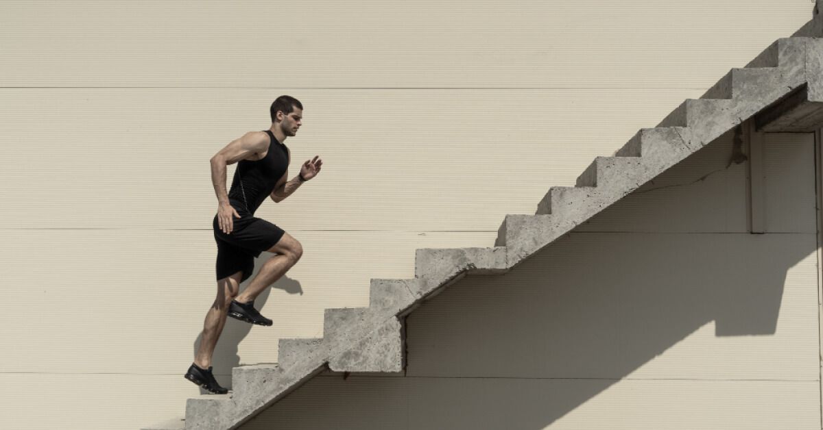 Man climbing on the steps