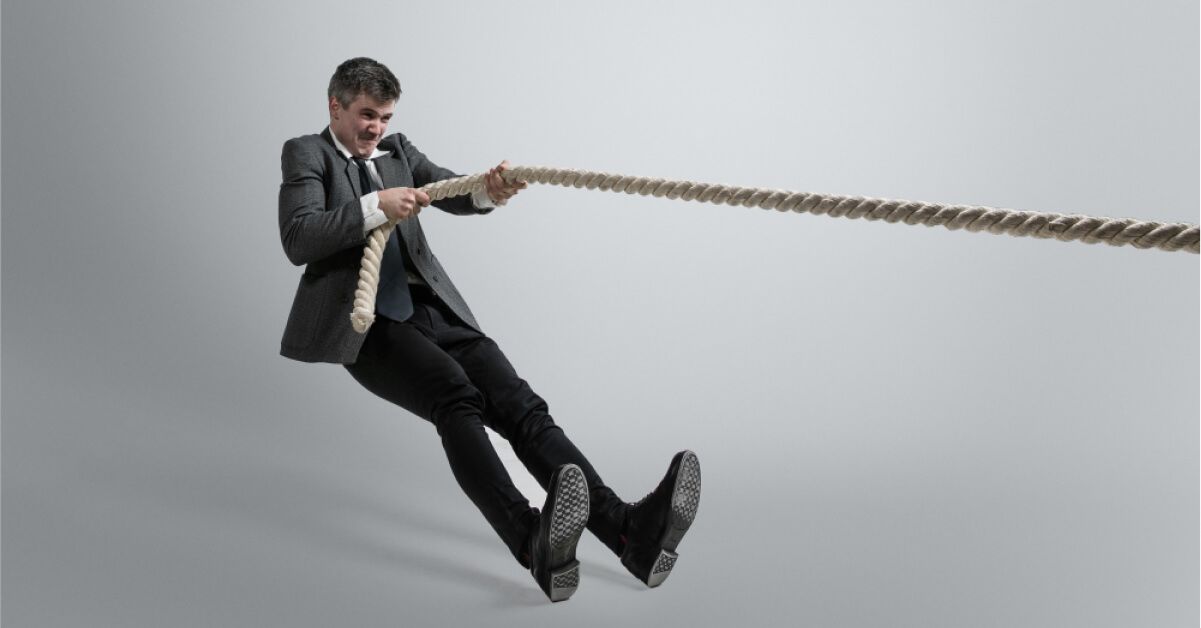 A man pulling a rope