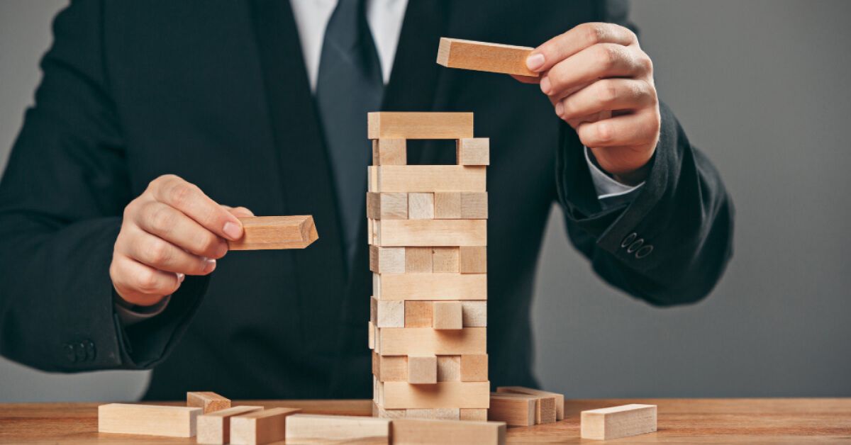 A man playing jenga