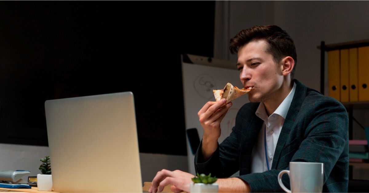 A man eating pizza