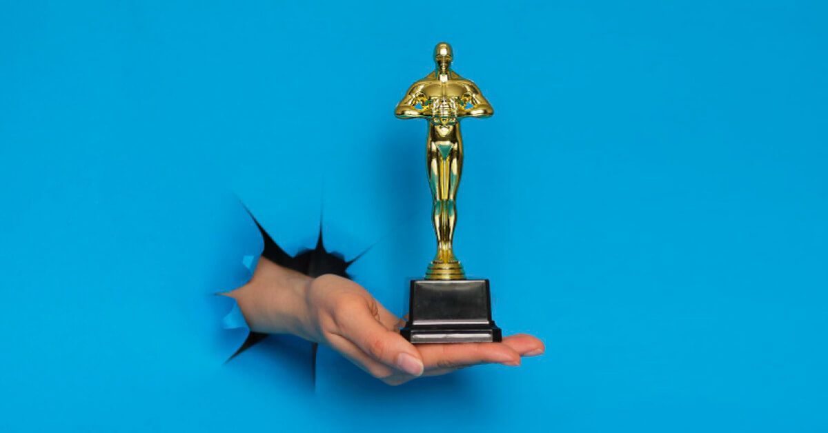 A man holding an award