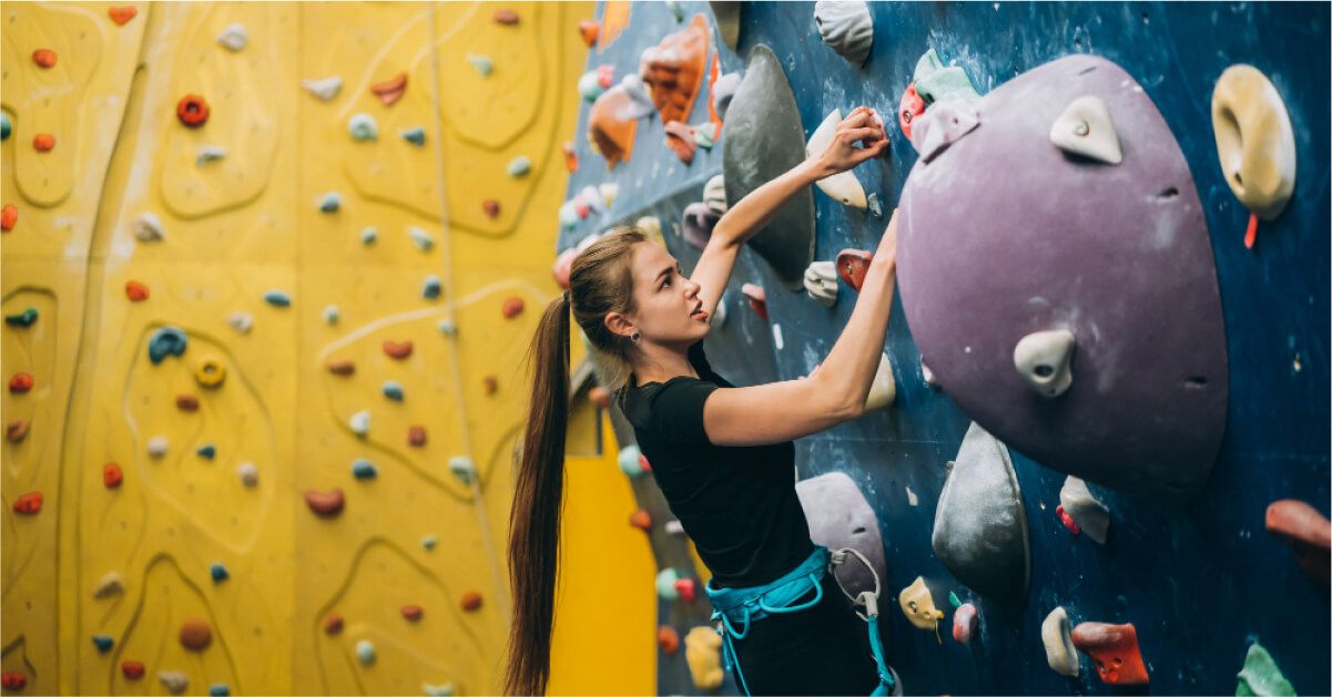 Woman rock climbing