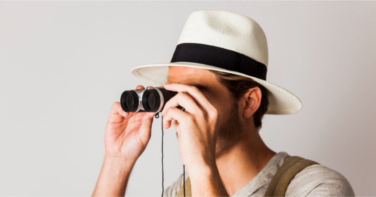  A man using binoculars