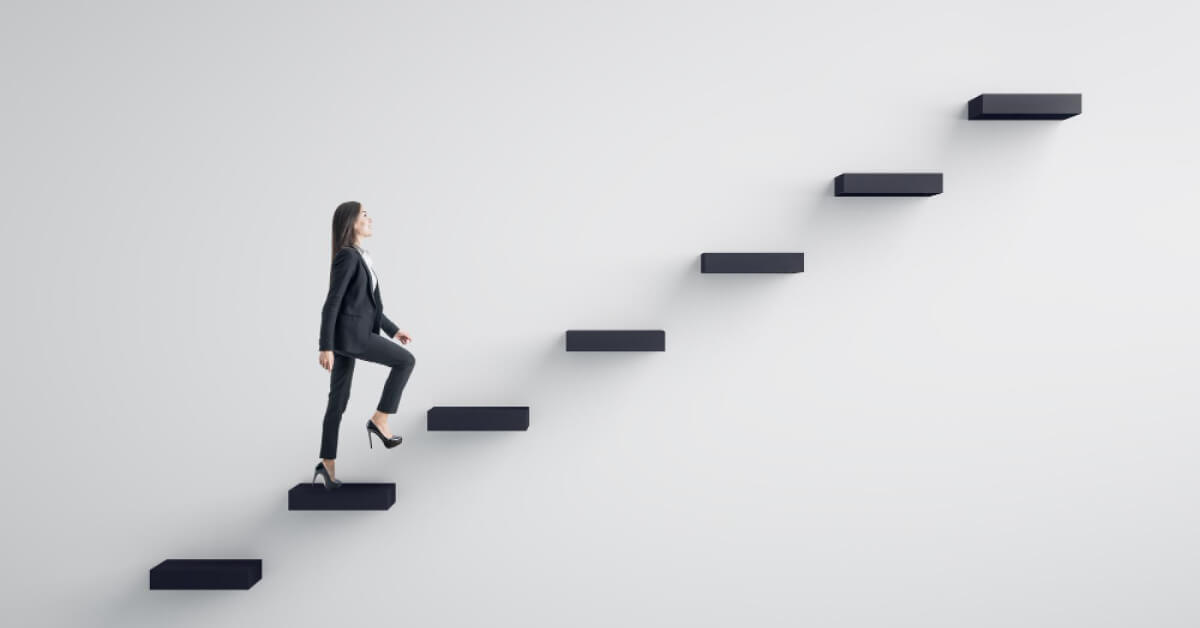 A female employee walking on the steps 