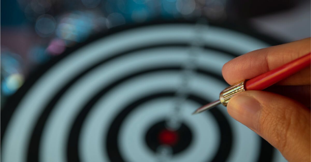 Employer throwing dart 