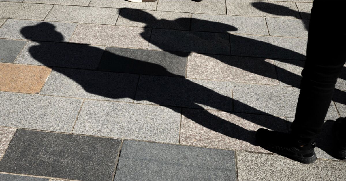 People shadows on the floor