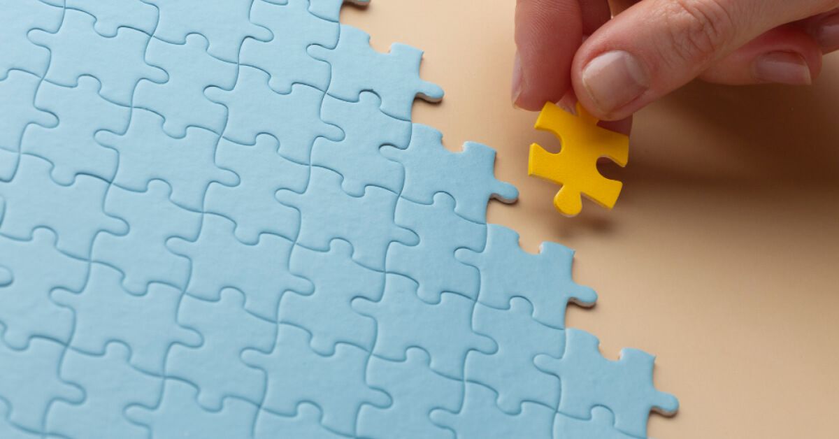 A man working on a puzzle