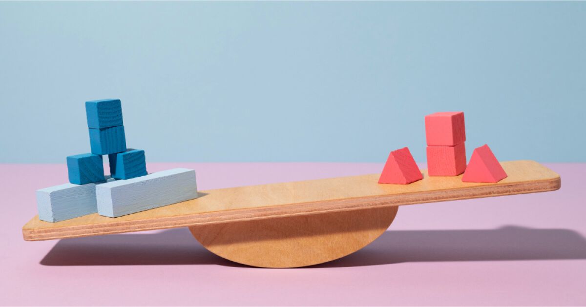 Blocks on a wooden balance