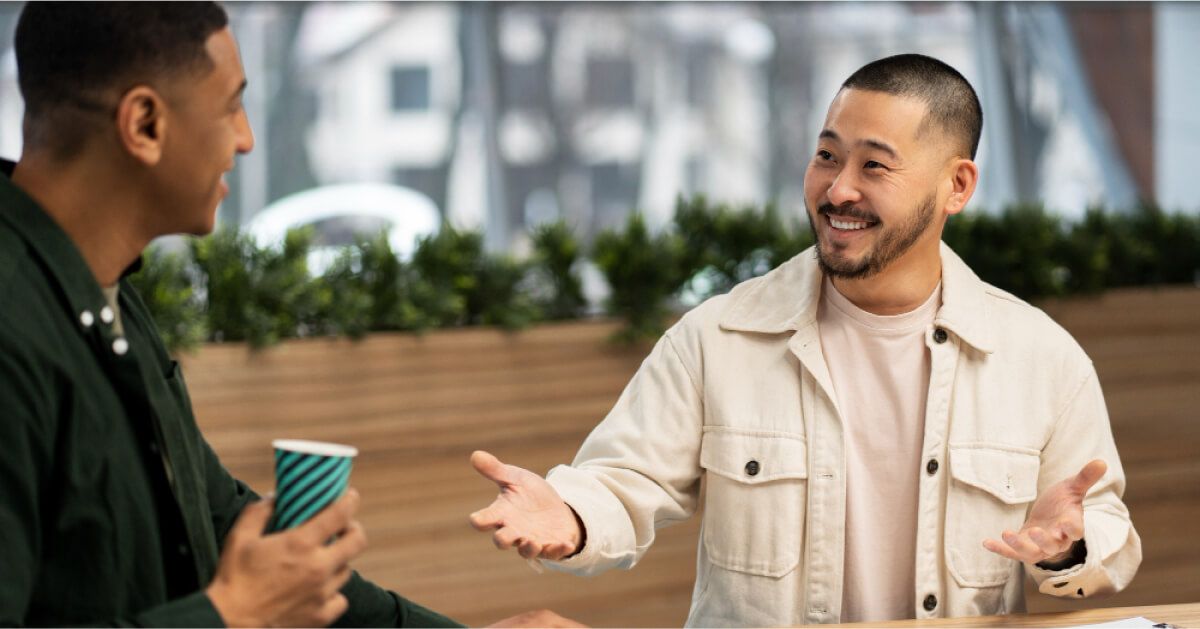 Employees are talking over a coffee 