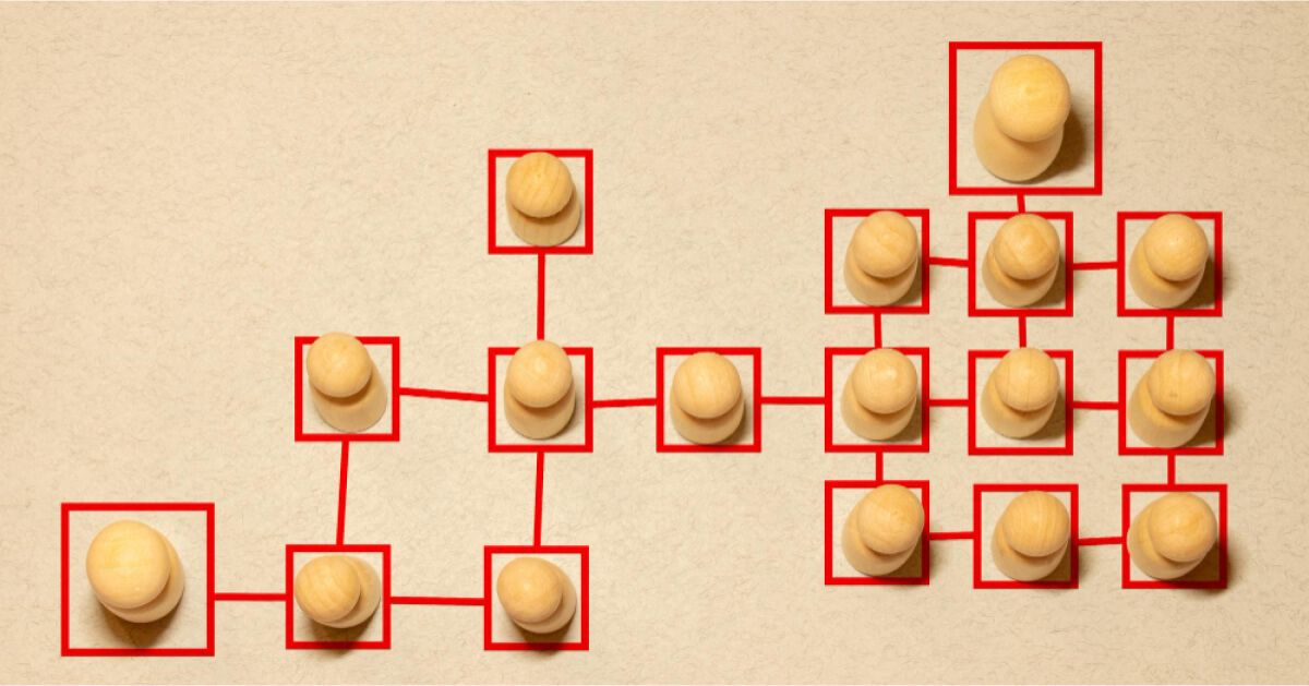 Wooden pegs arranged in a connected network structure, each enclosed by red square outlines.