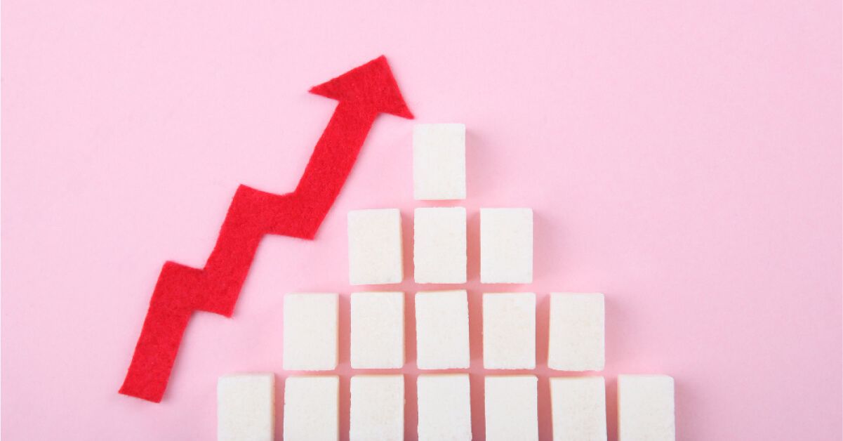 A red upward moving arrow next to a group of white blocks