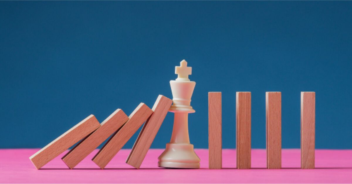 A chess piece stopping jenga pieces