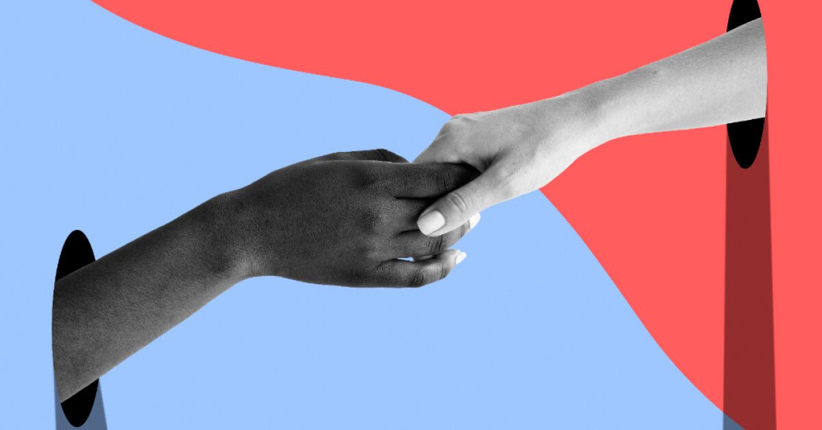 A black and white handshake placed against a colorful backdrop