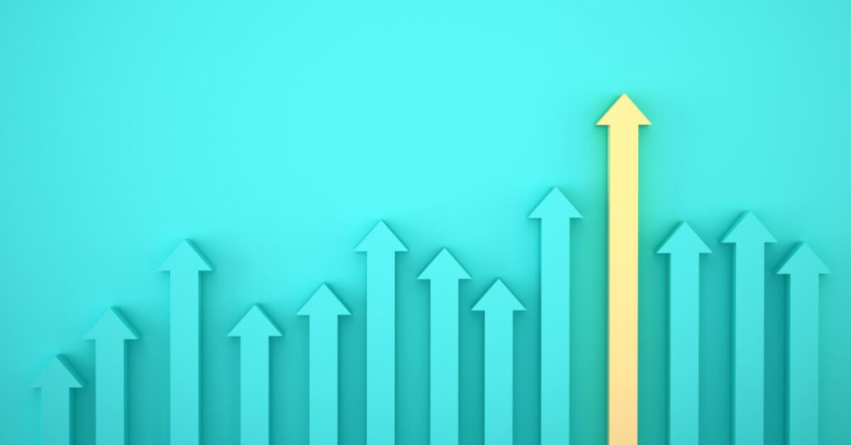 Yellow arrow amidst a group of blue upward moving arrows