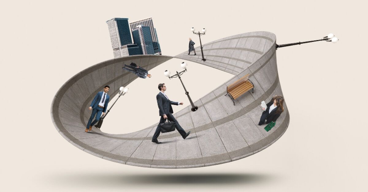 Business people walking on an infinite road loop