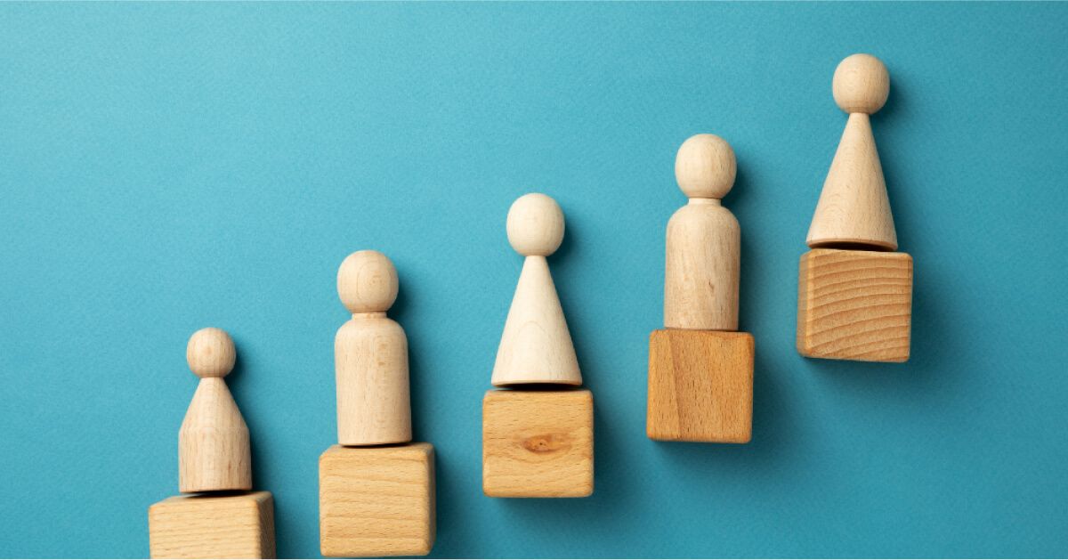 Figurines on a wooden block