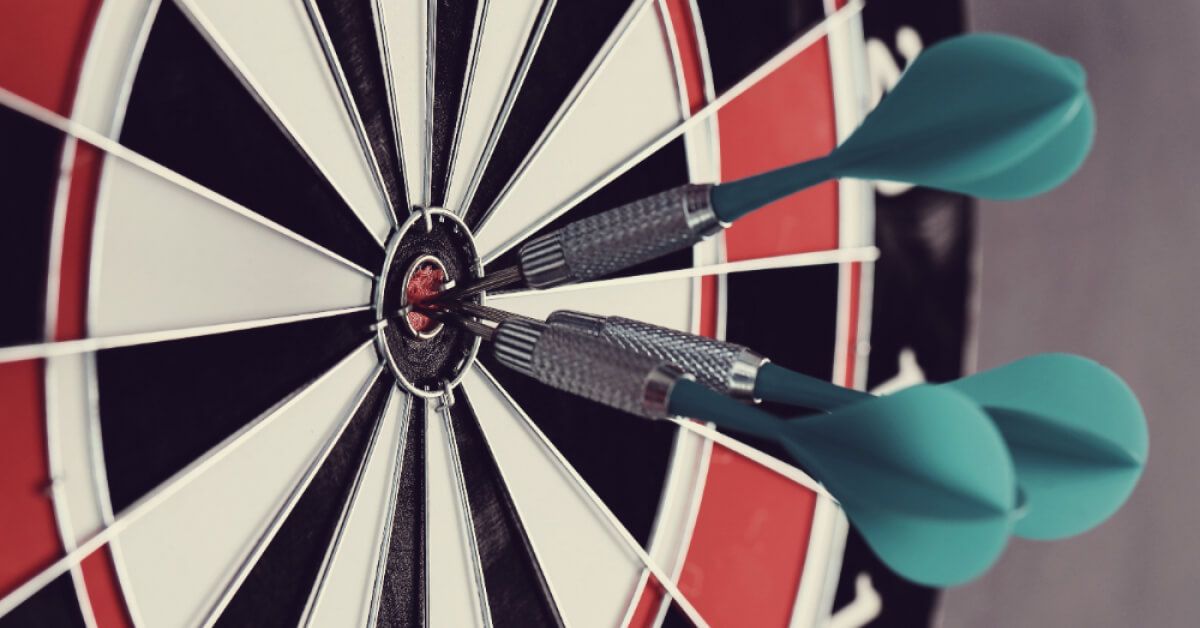 Dart arrows hitting the goal