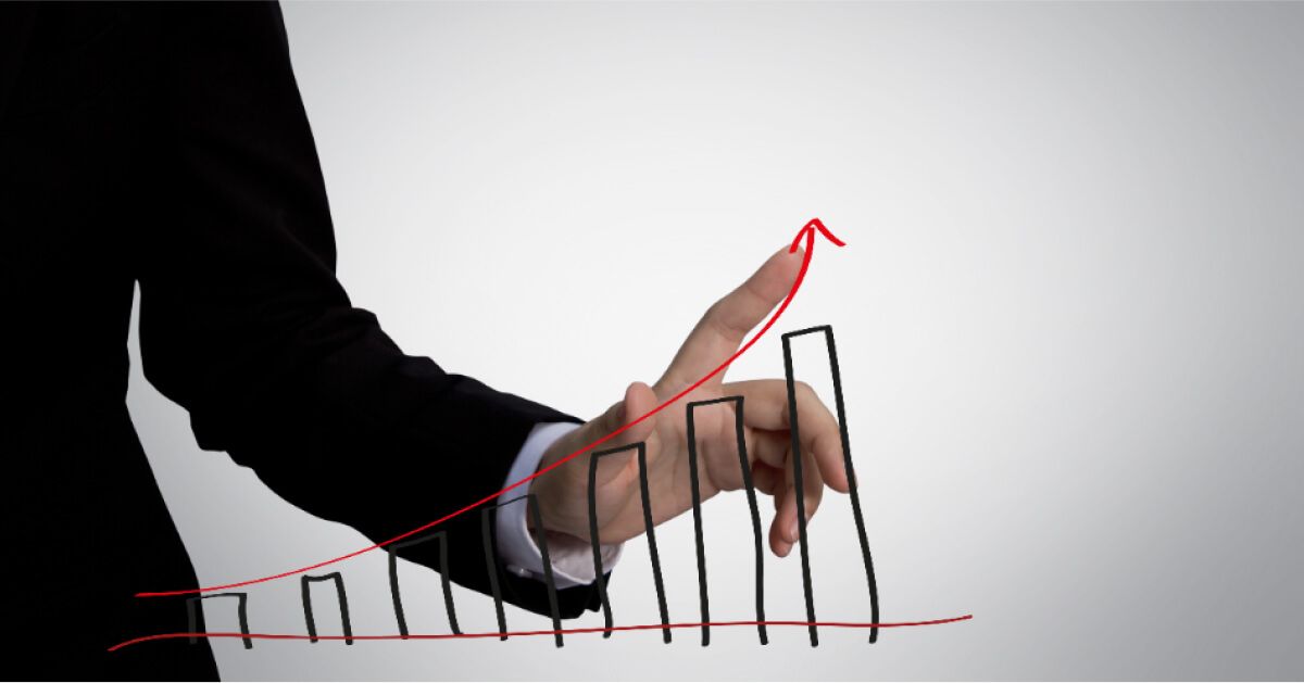 Person moving finger with a red upward arrow on an incremental bar graph