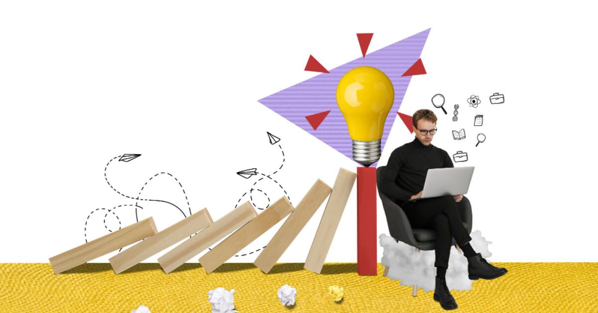 Person sitting next to a falling set of blocks and a lightbulb