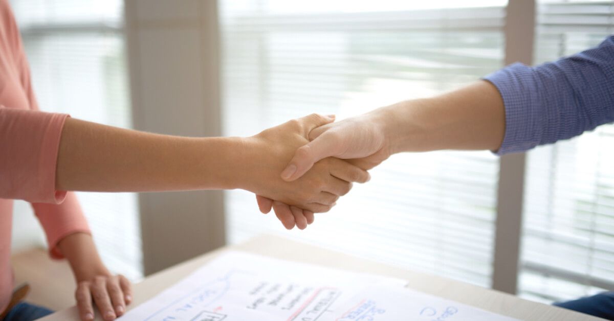 Two people shaking hands