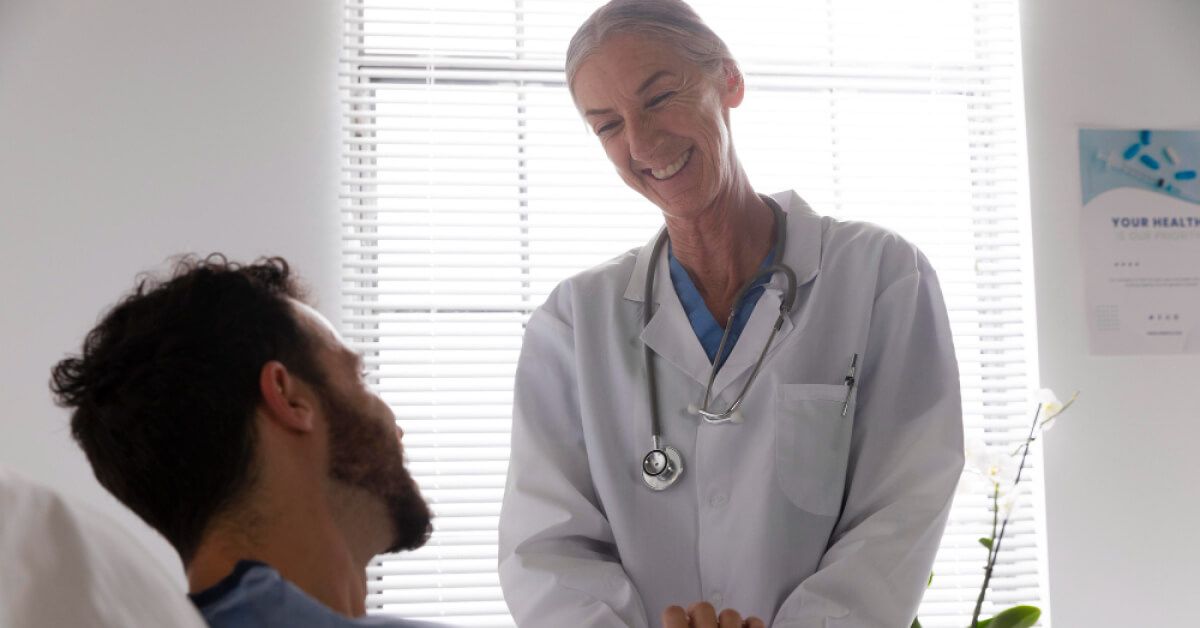 Cheerful interaction between a doctor and patient