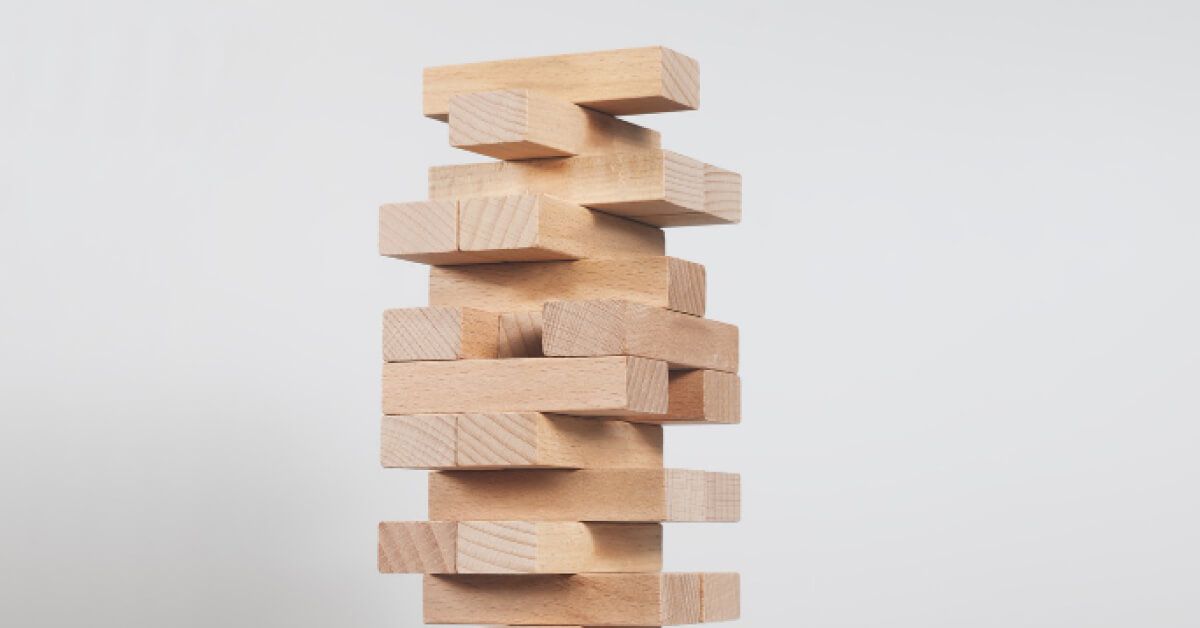 A tower of interlocked wooden blocks