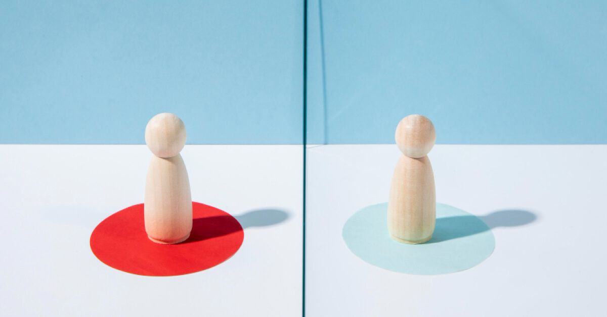 Two wooden pieces standing opposite to each other 