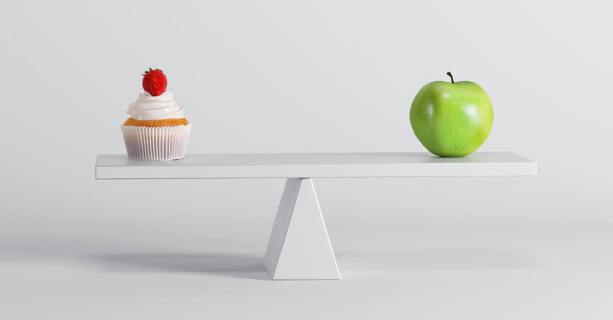 Balancing a cupcake and an apple