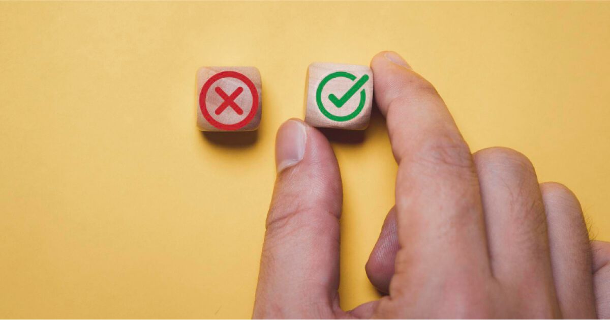 Tick mark and cross mark in wooden cubes