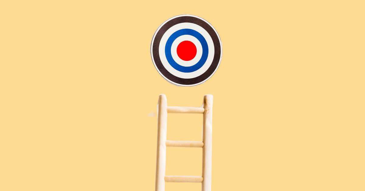 A ladder leading up to a target board