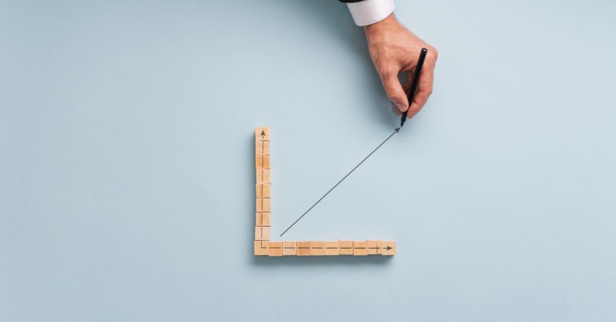 A man drawing a slope