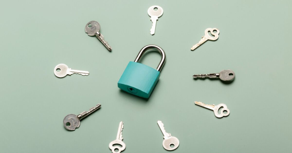 Keys arranged around a blue padlock