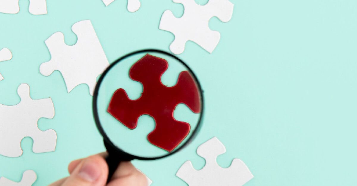 Puzzle pieces with magnifier 