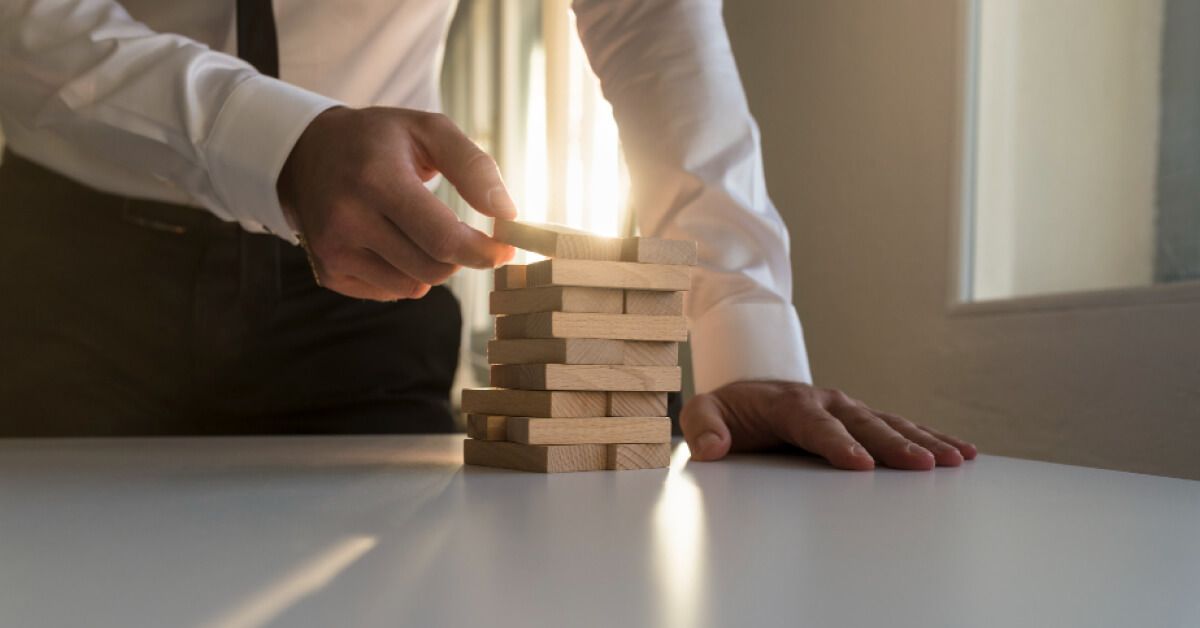 A man playing jenga