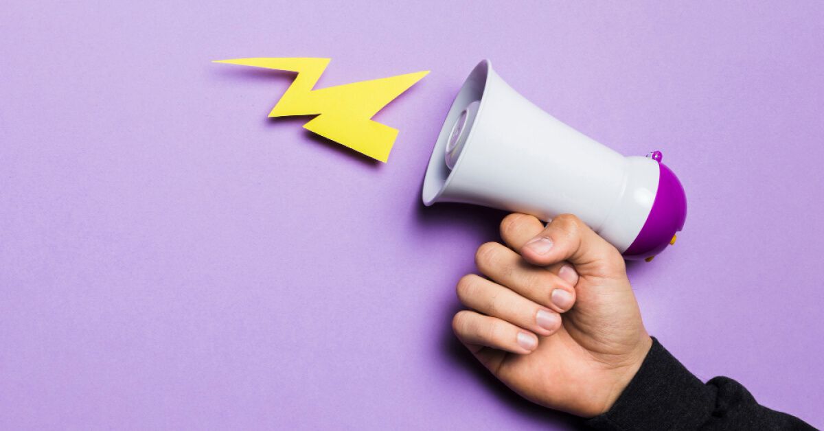 A person holding a megaphone