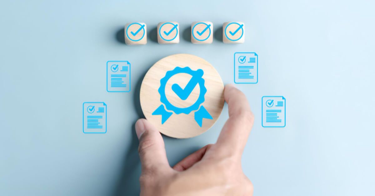 Person placing a circular wooden block with graphics on it