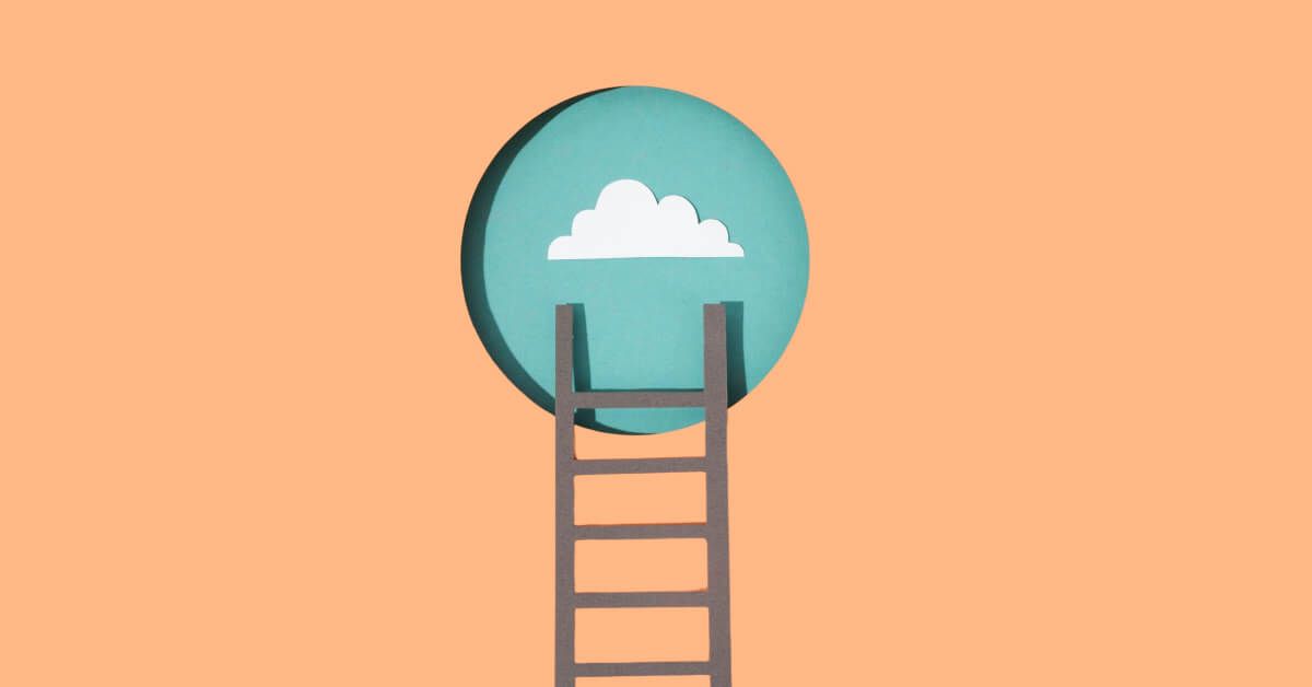 Paper cutout of a ladder leading up to a cloud